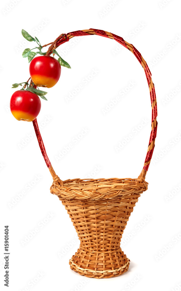 Wicker basket decorated with two artificial apples