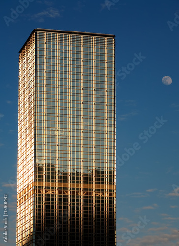 Skyscraper and moon photo