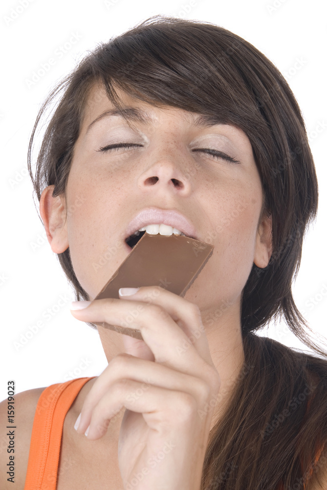 beautiful woman enjoying eating chocolate beautiful woman enjoying eating chocolate
