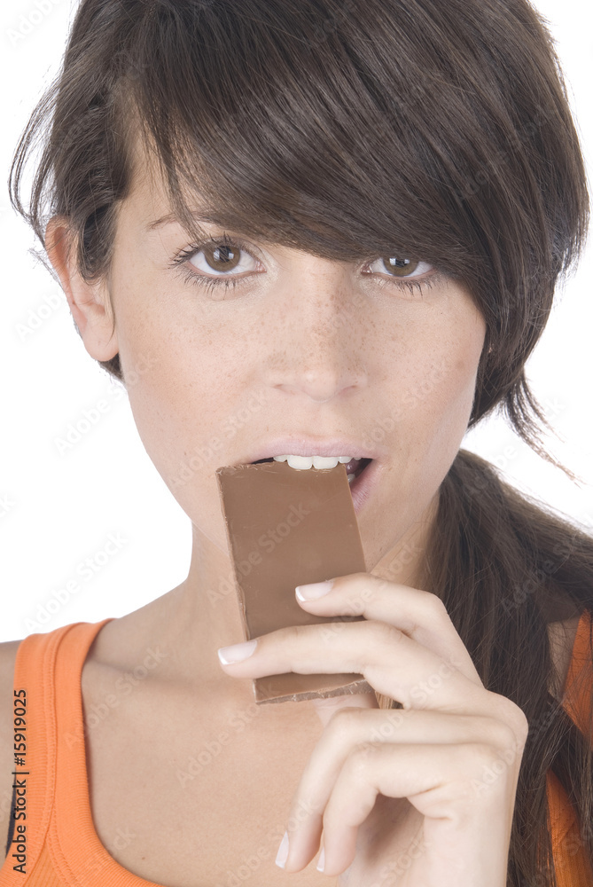 beautiful woman enjoying eating chocolate beautiful woman enjoying eating chocolate