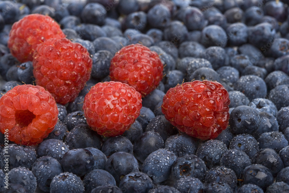 Fresh raspberries and blueberries Fresh raspberries and blueberries