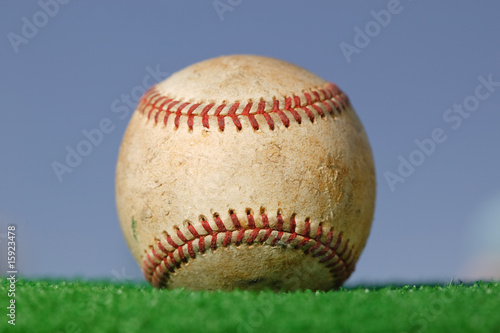 Baseball on Green Grass