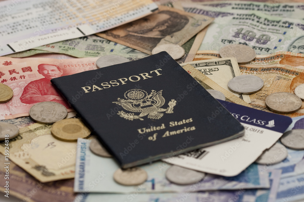 Passport with Foreign Money and Plane Tickets Passport with Foreign Money and Plane Tickets
