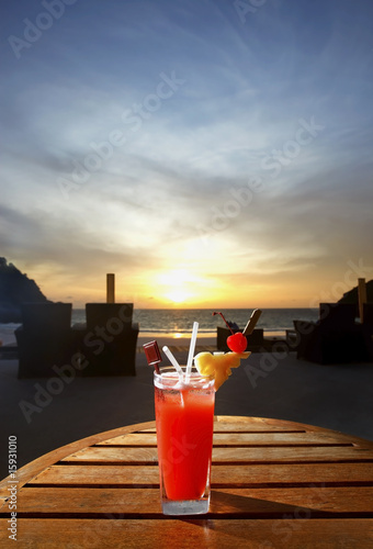 sweet cocktail on sunset beach