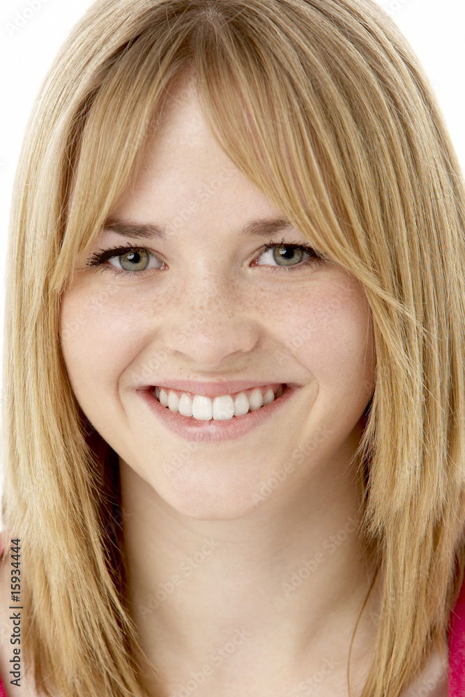 Studio Portrait Of Smiling Teenage Girl Studio Portrait Of Smiling Teenage Girl