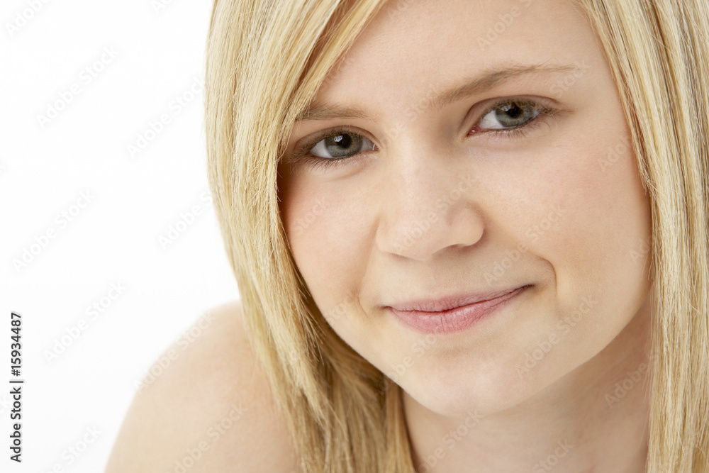 Studio Portrait Of Smiling Teenage Girl Studio Portrait Of Smiling Teenage Girl