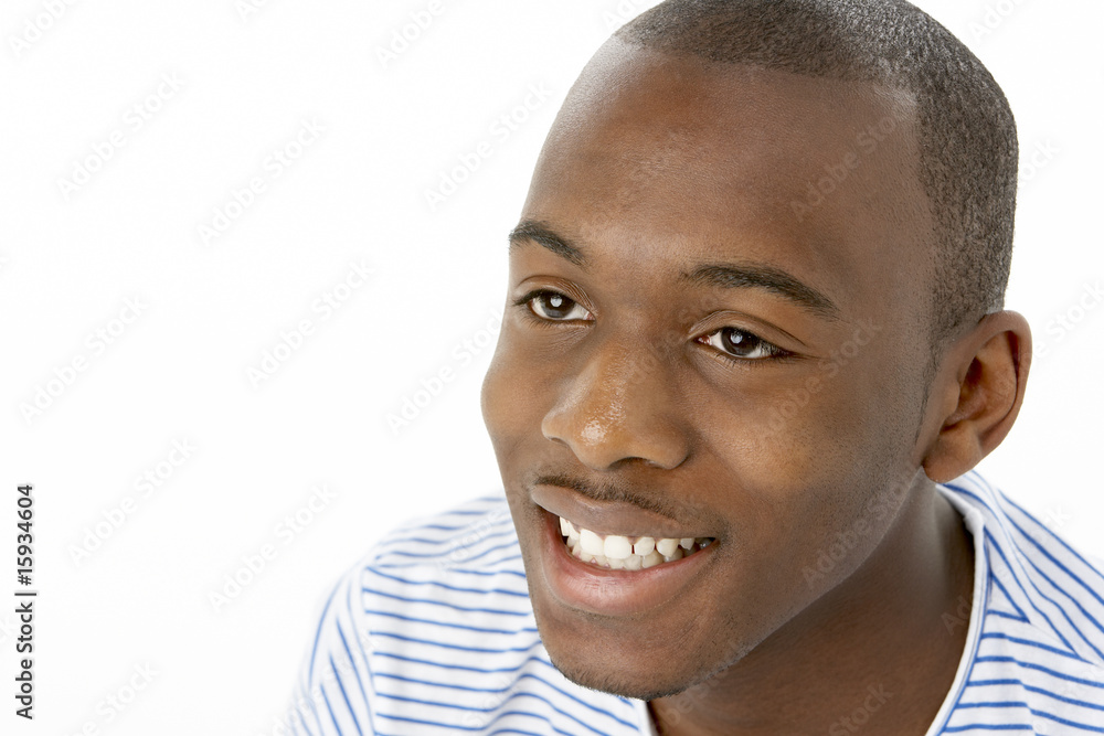 Obraz premium Studio Portrait Of Smiling Teenage Boy