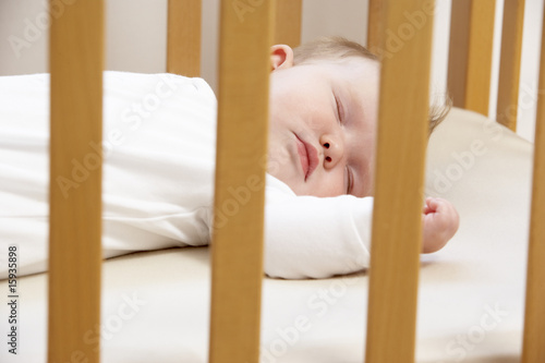 Newborn Baby In Cot