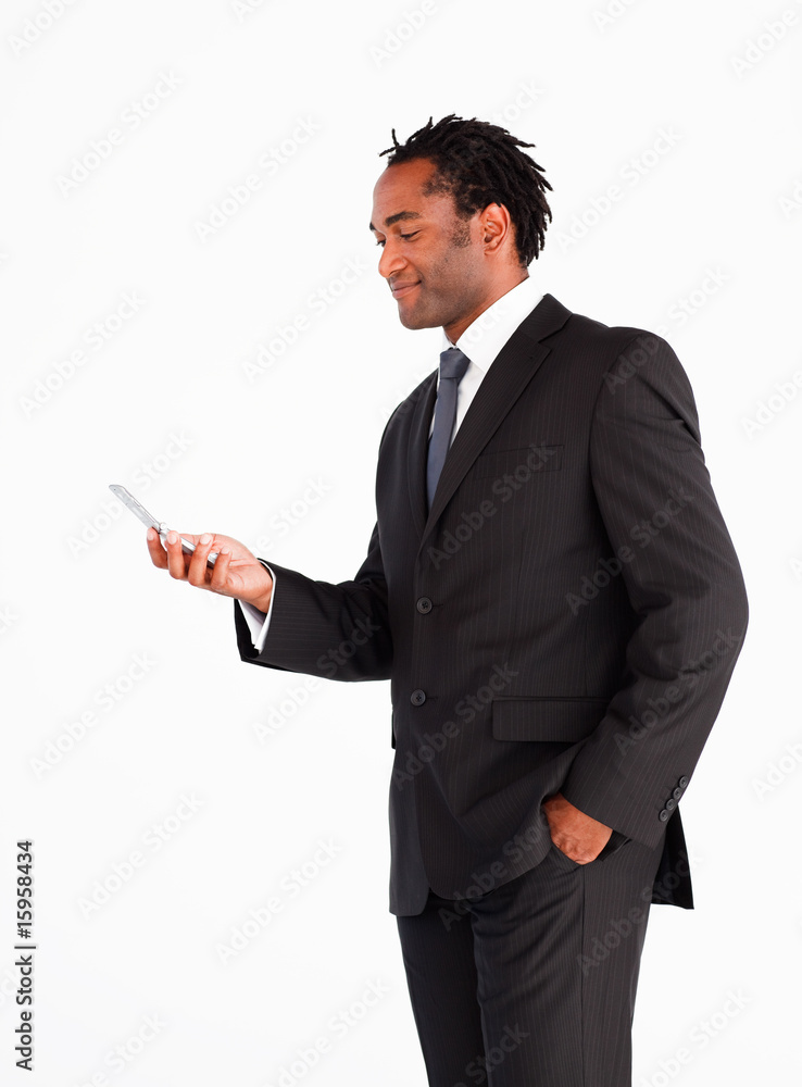 Businessman sending text message Businessman sending text message