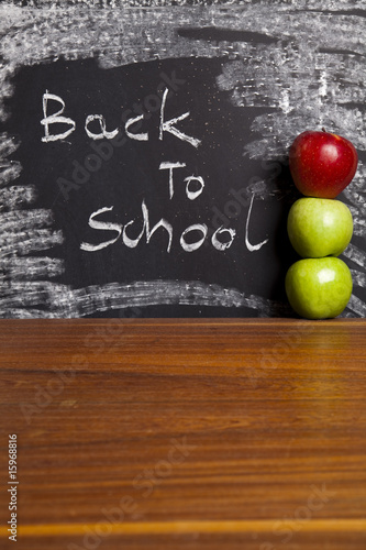 Fototapeta Naklejka Na Ścianę i Meble -  Apple on a chalkboard - healthy breakfast at school