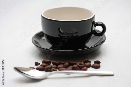 Espresso cup and coffee beans