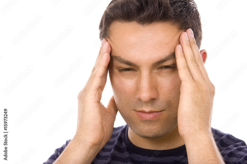 young casual man with a headache, isolated on white young casual man with a headache, isolated on white