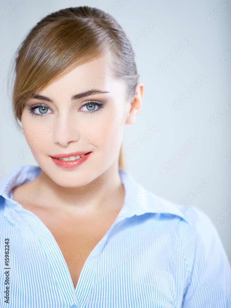 Portrait of beautiful business woman isolated on blue Portrait of beautiful business woman isolated on blue