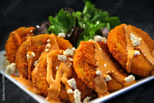 Fried Green Tomatoes covered with Feta Cheese