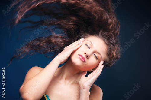 Woman with fluttering hair