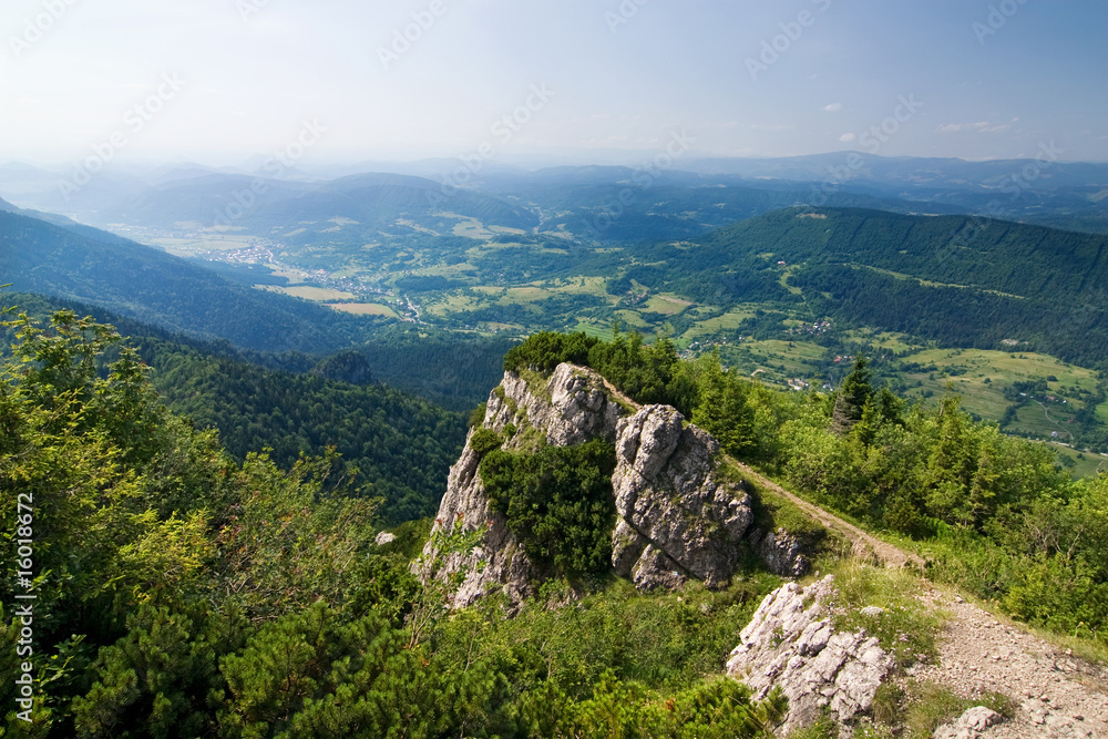 Fototapeta premium Mountain-ridge and blue sky in summer