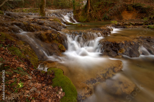 Fototapeta Naklejka Na Ścianę i Meble -  Waterfalls in the forest in spring in the mountains