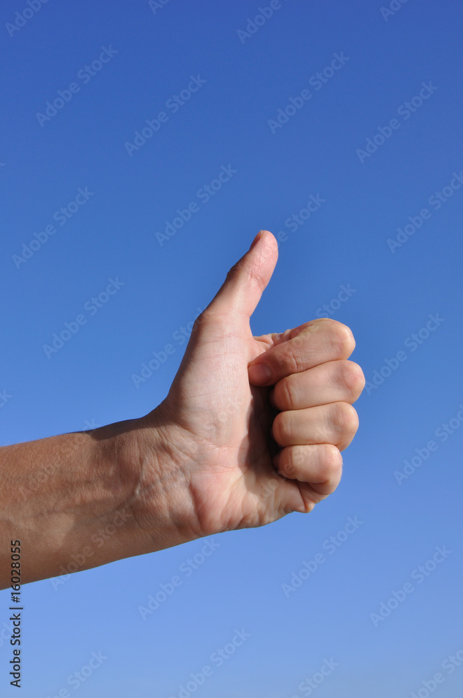 Woman hand - thumb up