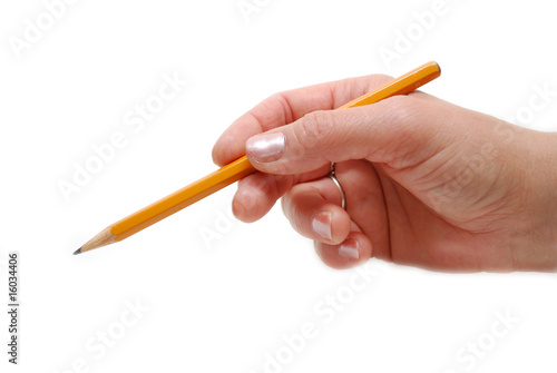 A hand pointing on something with a pencil
