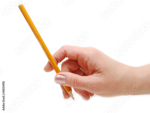 A hand pointing on something with a pencil