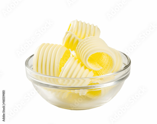 Butter curls in a glass bowl