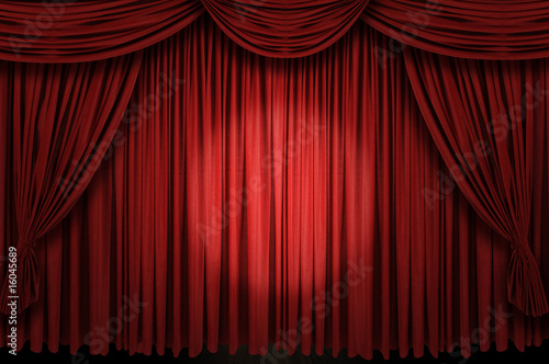 Large red curtain stage ans spot light