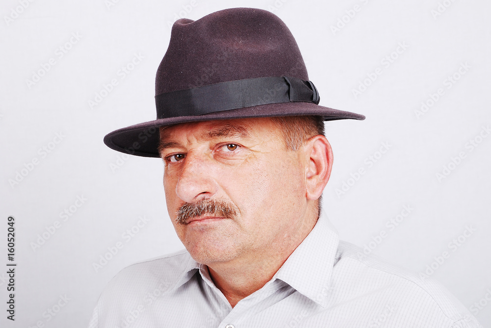 Senior man with mustache and hat on head Senior man with mustache and hat on head