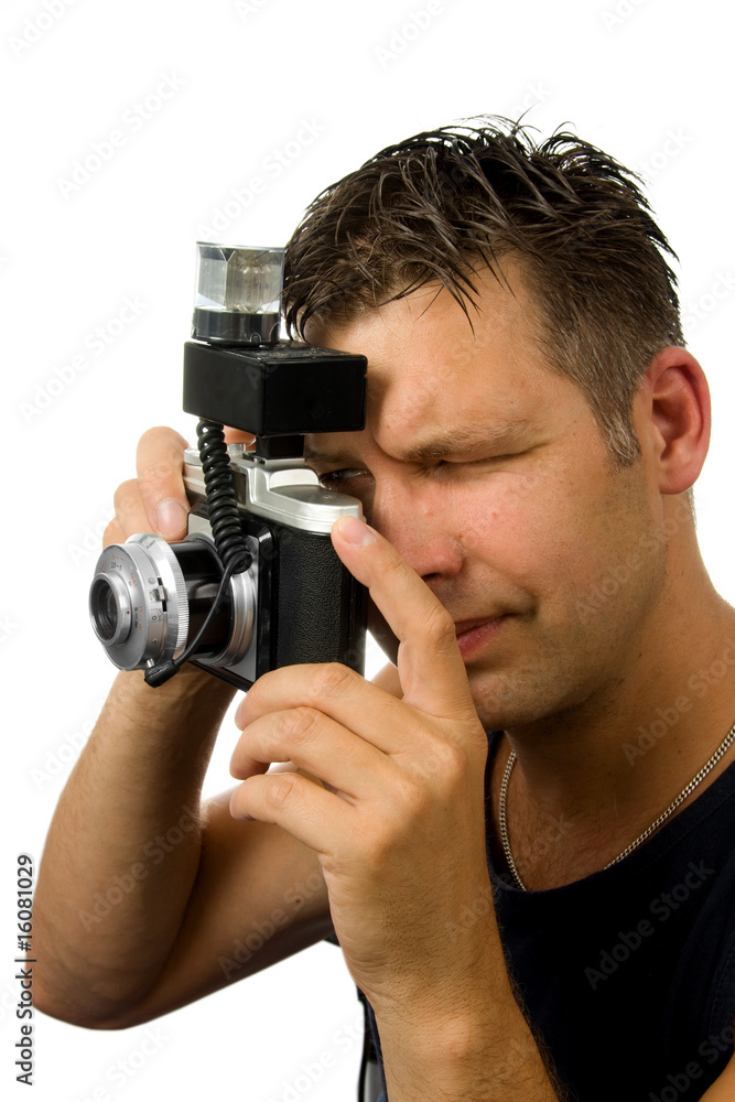Man is taking photo with old fashioned camera Man is taking photo with old fashioned camera