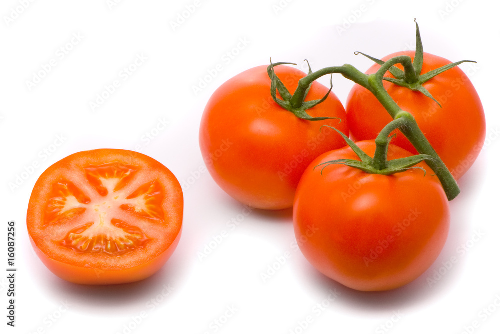 Fresh tomatoes. Macro studio isolated on white. Fresh tomatoes. Macro studio isolated on white.