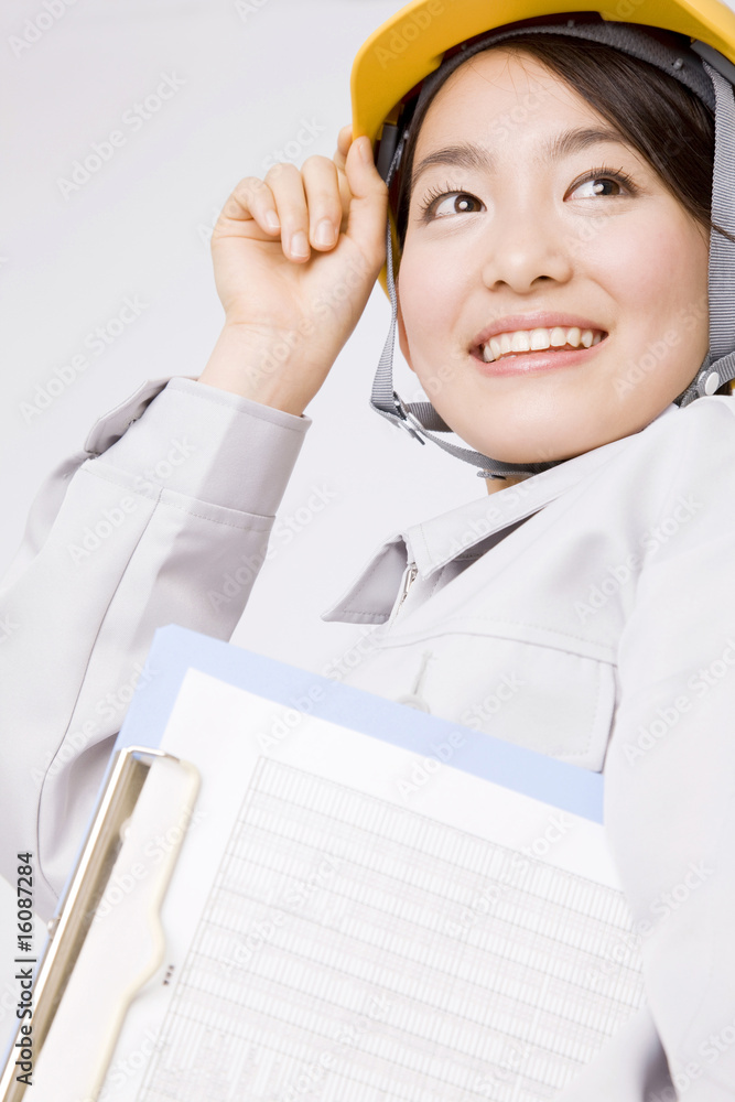 作業服の女性ポートレート Stock Photo Adobe Stock