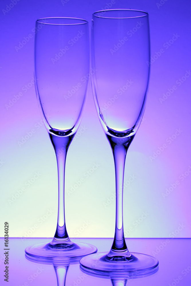 Obraz premium Pair of champagne glass (isolated on blue)