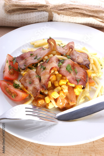 Pasta with bacon and sweet corn tomato sauce