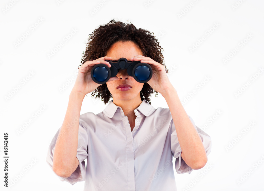 Portrait of a African businesswoman using binoculars Portrait of a African businesswoman using binoculars