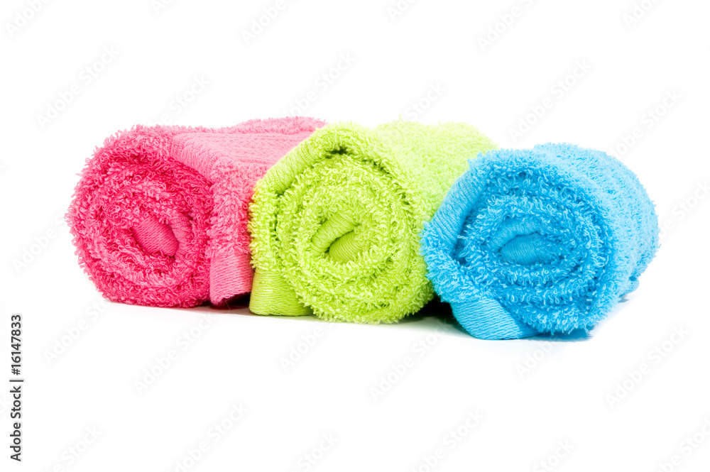 Colorful towel rolls on a white background Colorful towel rolls on a white background
