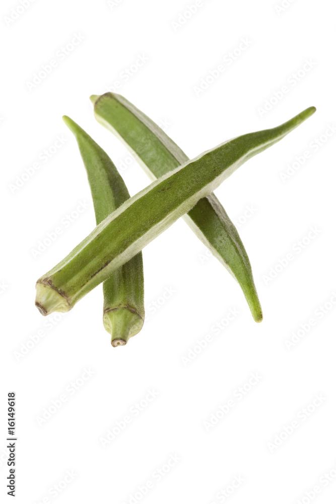 Fototapeta premium Three green okras on a white background