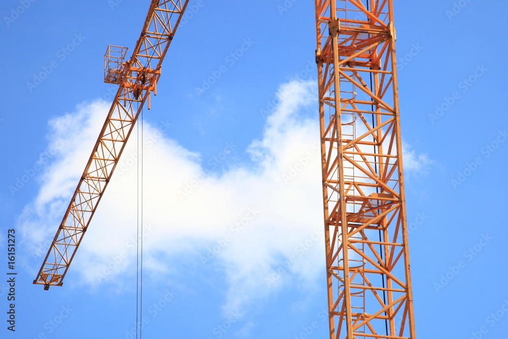 Baukran Ausleger Hochbau blauer Himmel Baukran Ausleger Hochbau blauer Himmel