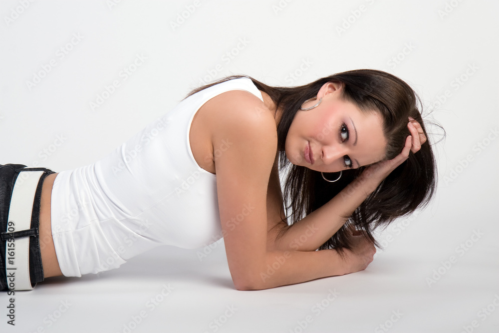 Naklejka premium beautiful young brunette girl