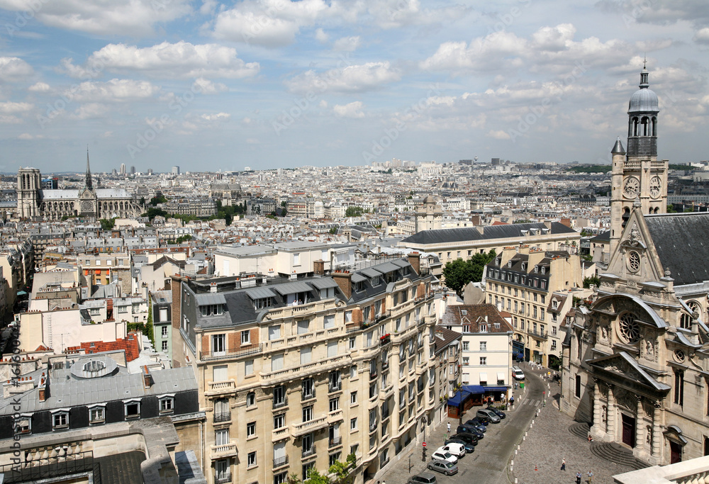 Fototapeta Paris skyline and high view of Church St. Etienne du Monts
