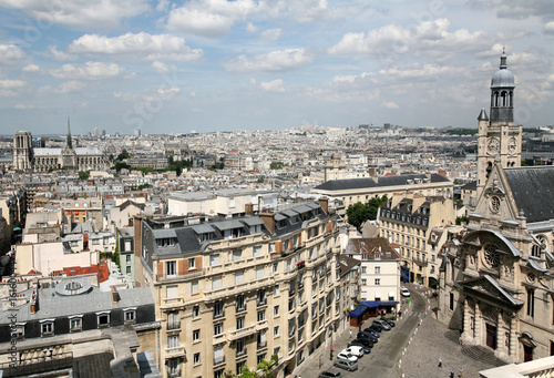 Paris skyline and high view of Church St. Etienne du Monts