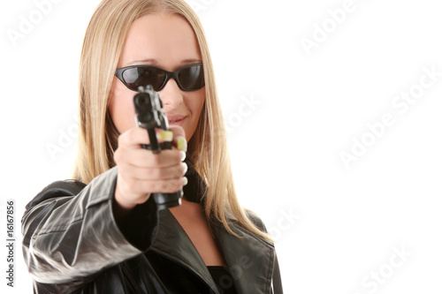 Portrait of the blonde with gun