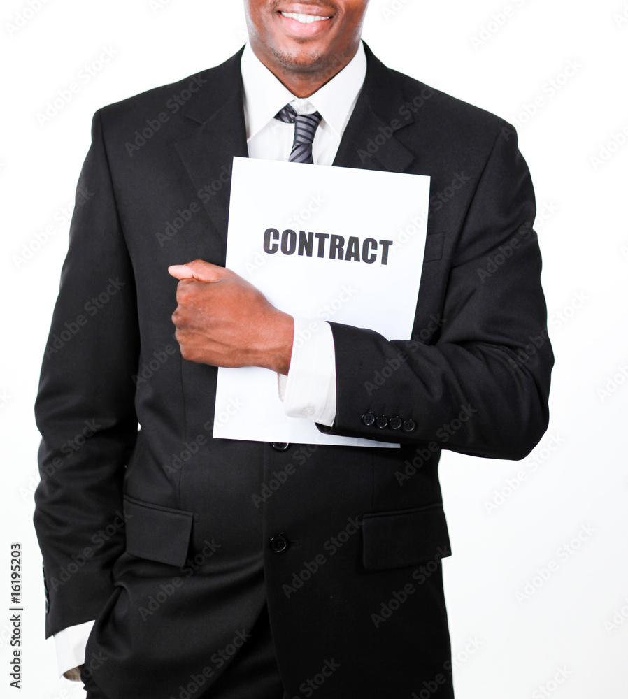 Close-up of a businessman holding a contract Close-up of a businessman holding a contract