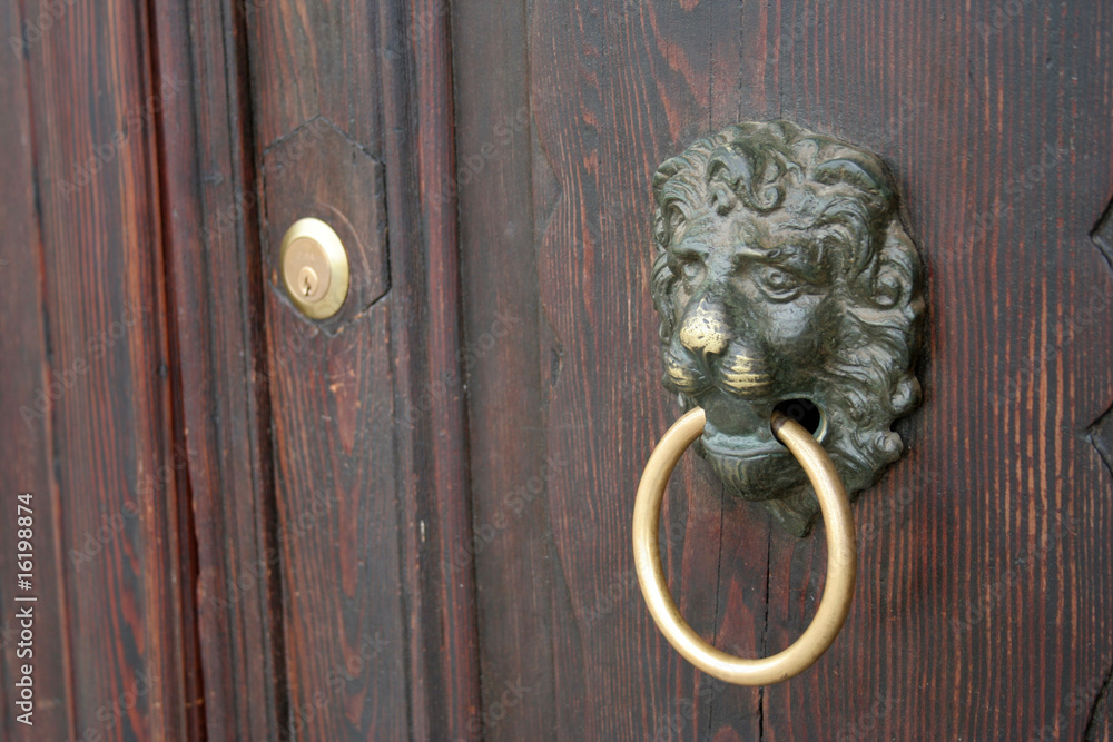 old venetian door knocker with a nice lion head old venetian door knocker with a nice lion head