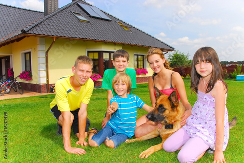 Siblings with dog