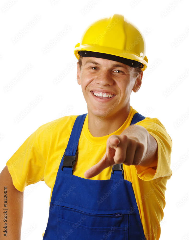 Happy young worker pointing at you and smile Happy young worker pointing at you and smile