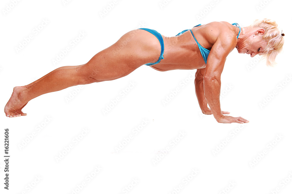 Fototapeta premium Woman doing pushups.