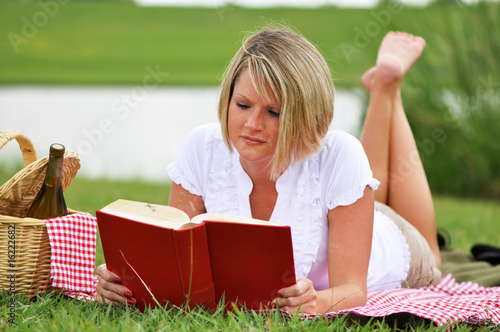 Woman on Picnic with Book and Wine