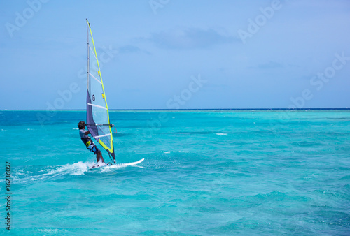windsurfer on blue water