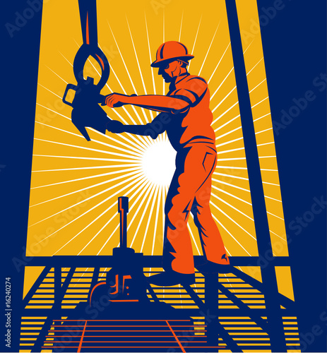 Oil well worker hoisting hook on platform