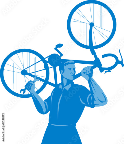 Mechanic carrying bicycle on shoulders