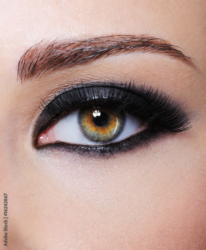 Eye with bright black glamour make-up Eye with bright black glamour make-up
